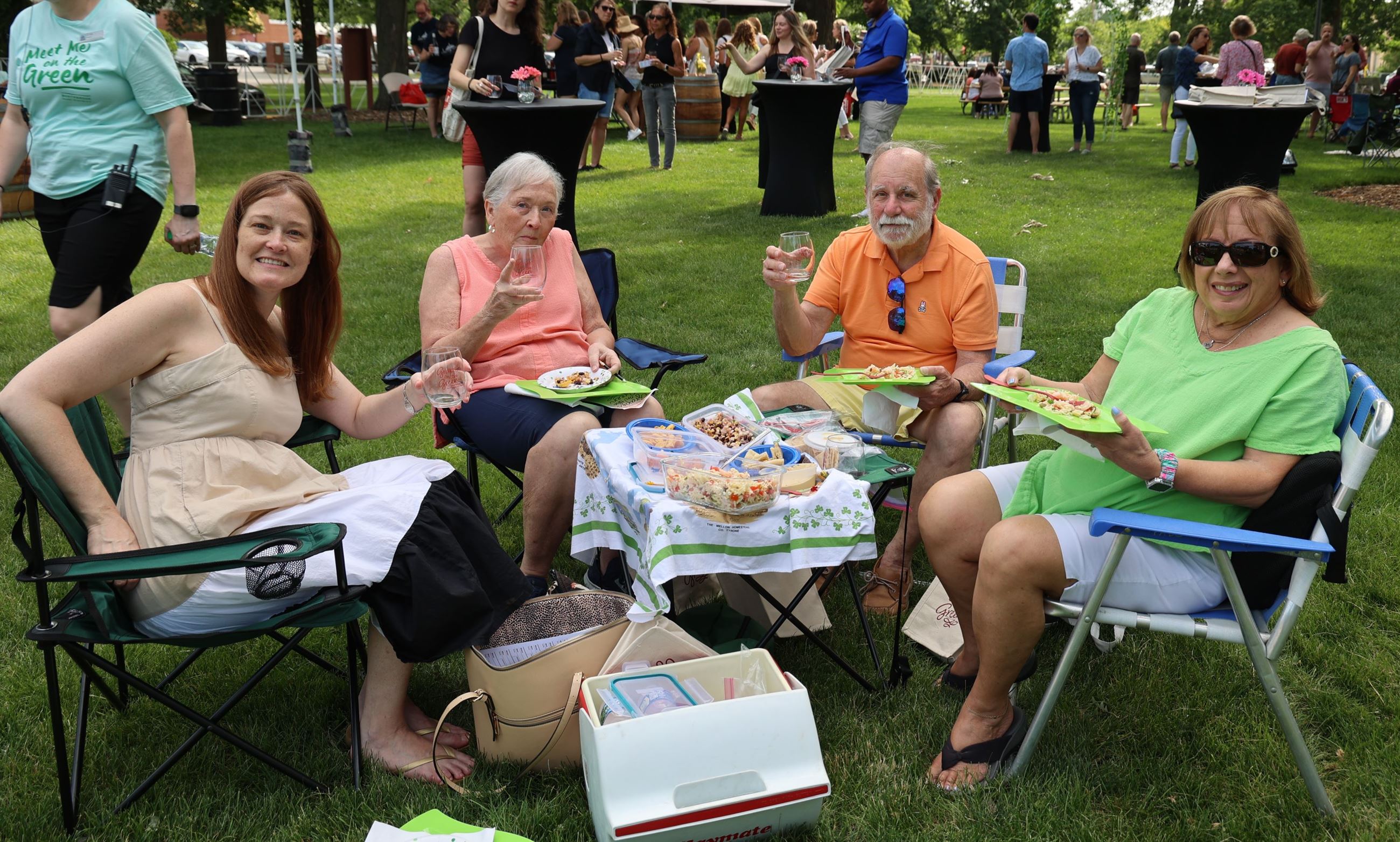 Group of attendees at the Grapes on the Green event. 